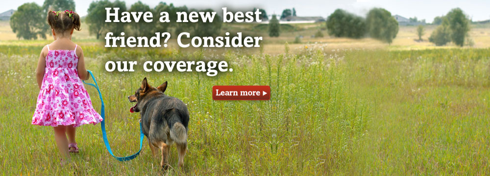 Little girl with dog on leash. Consider Trupanion pet insurance for your new pet.